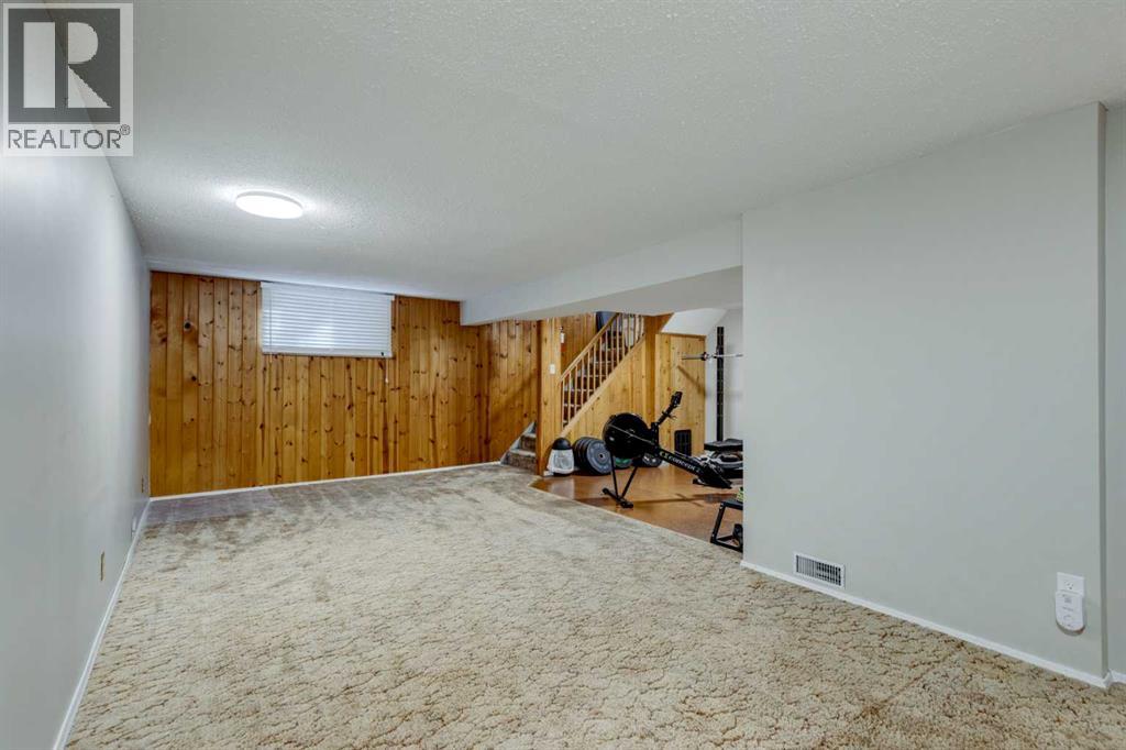 Single Family House Bungalow for Sale in  Bearspaw Drive NW Brentwood Calgary 