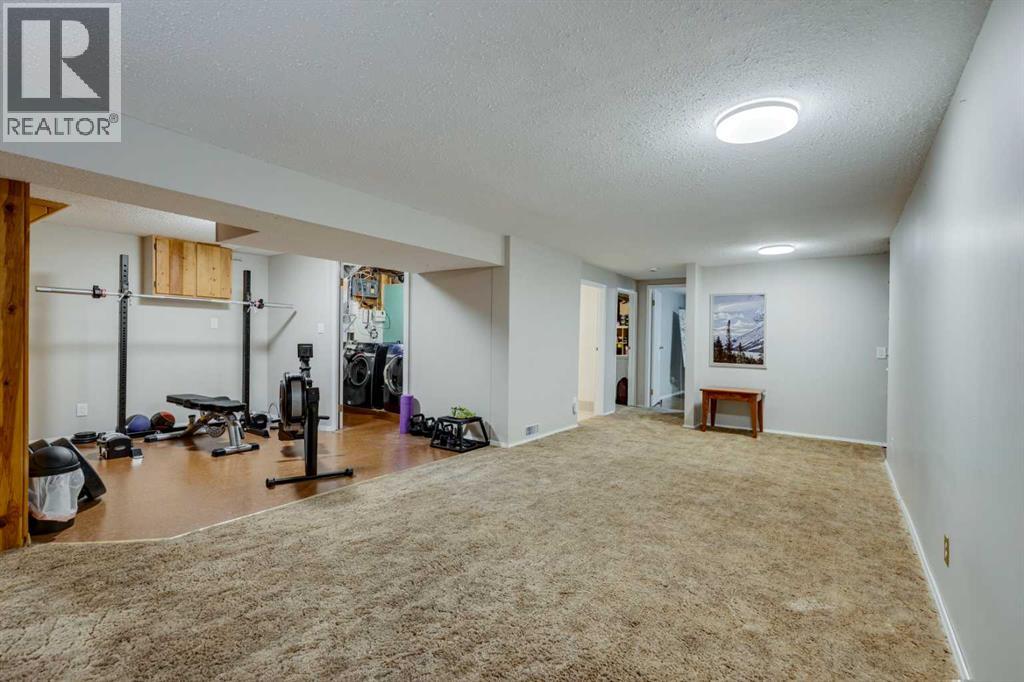 Single Family House Bungalow for Sale in  Bearspaw Drive NW Brentwood Calgary 