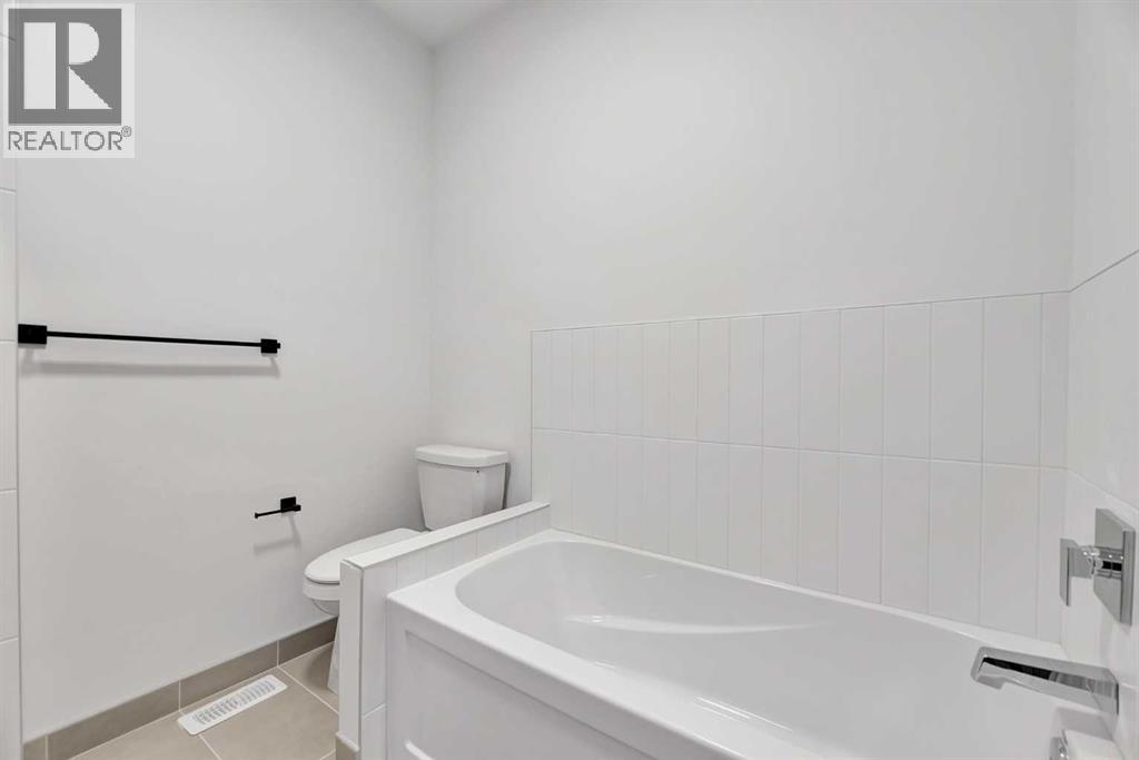 Multi-family House for Sale in  Bowness Road NW Montgomery Calgary 