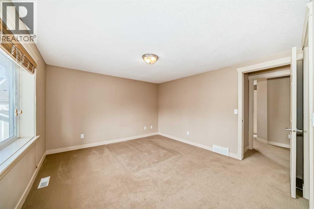 Single Family House for Sale in  Ypres Green SW Garrison Woods Calgary 