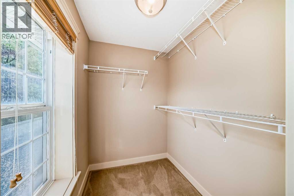 Single Family House for Sale in  Ypres Green SW Garrison Woods Calgary 