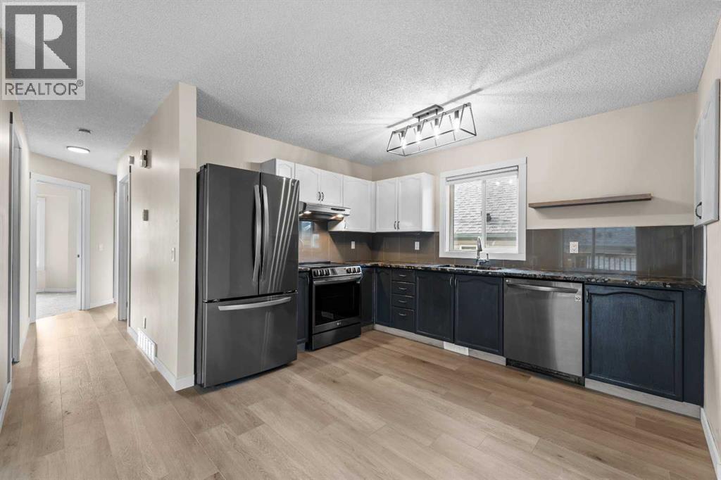 Single Family House Bi-level for Sale in  Laguna Way NE Monterey Park Calgary 