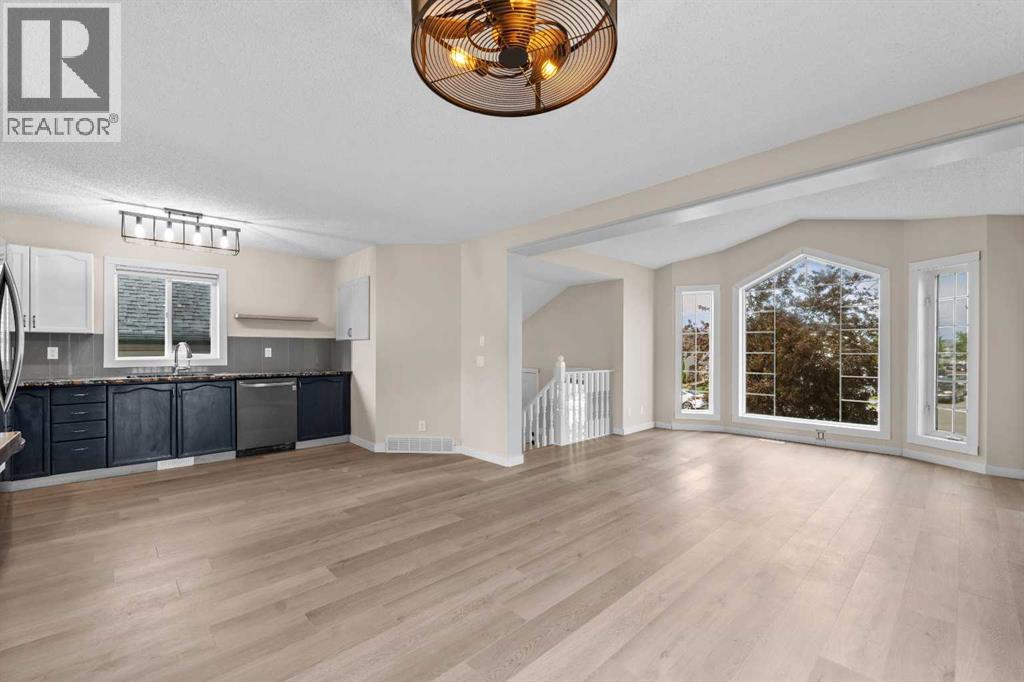 Single Family House Bi-level for Sale in  Laguna Way NE Monterey Park Calgary 