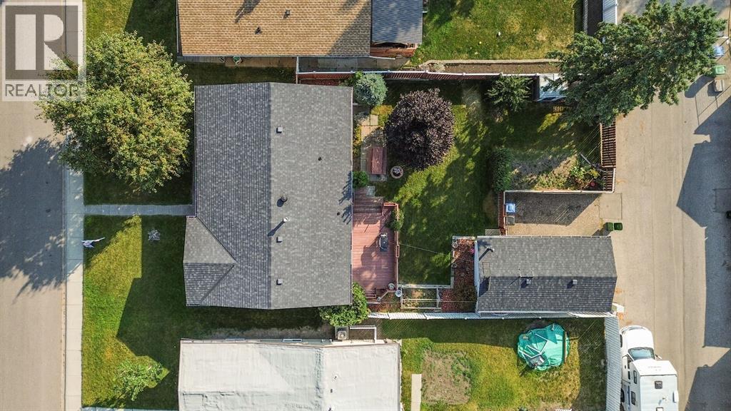 Single Family House Bi-level for Sale in  Brazeau Crescent SW Braeside Calgary 