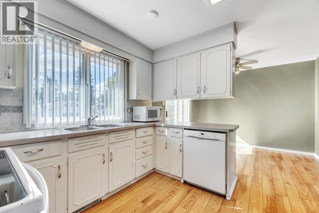 Single Family House Bi-level for Sale in  Brazeau Crescent SW Braeside Calgary 