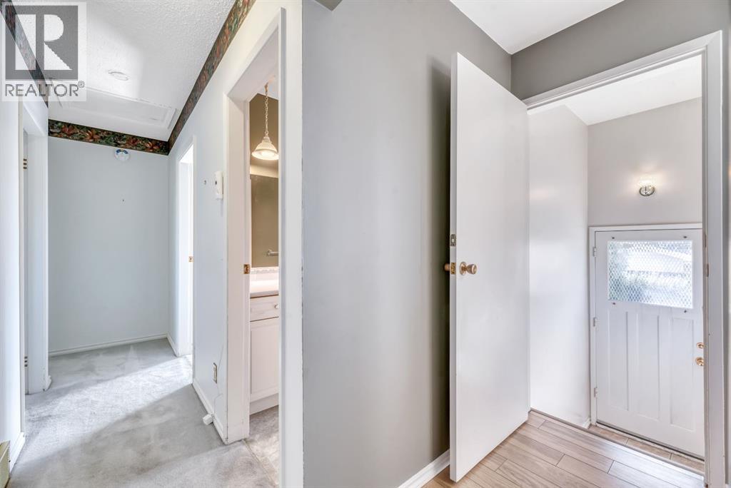 Single Family House Bi-level for Sale in  Brazeau Crescent SW Braeside Calgary 