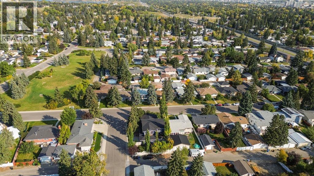 Single Family House Bi-level for Sale in  Brazeau Crescent SW Braeside Calgary 