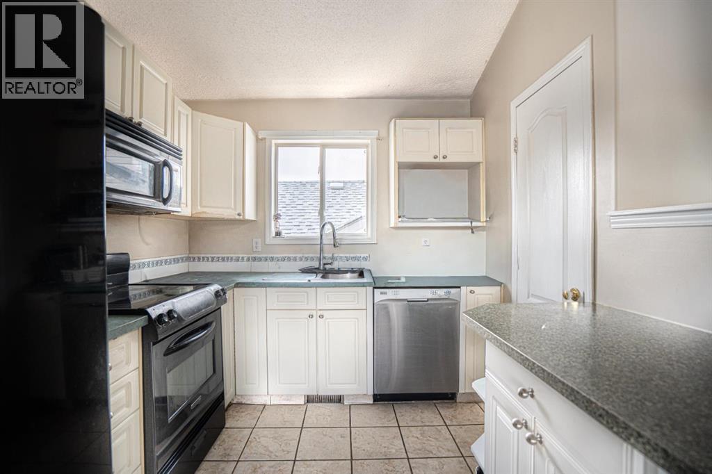 Single Family House 4 Level for Sale in  Laguna Way NE Monterey Park Calgary 