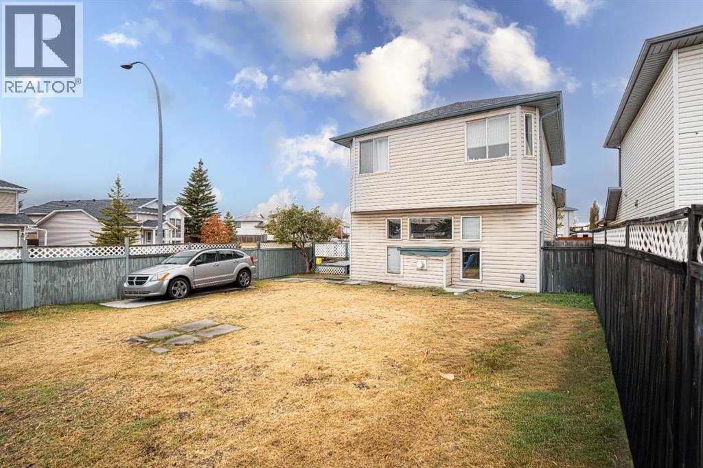 Single Family House 4 Level for Sale in  Laguna Way NE Monterey Park Calgary 