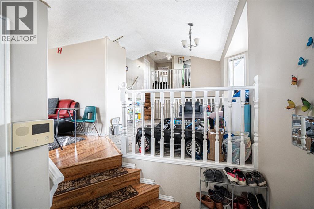 Single Family House 4 Level for Sale in  Laguna Way NE Monterey Park Calgary 