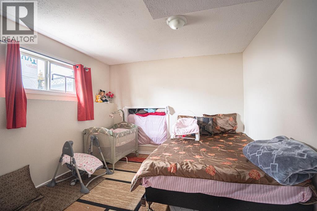 Single Family House 4 Level for Sale in  Laguna Way NE Monterey Park Calgary 