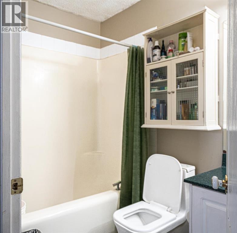 Single Family House 4 Level for Sale in  Laguna Way NE Monterey Park Calgary 