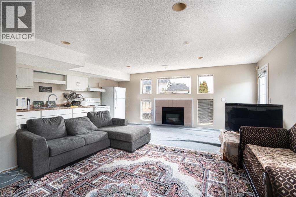 Single Family House 4 Level for Sale in  Laguna Way NE Monterey Park Calgary 