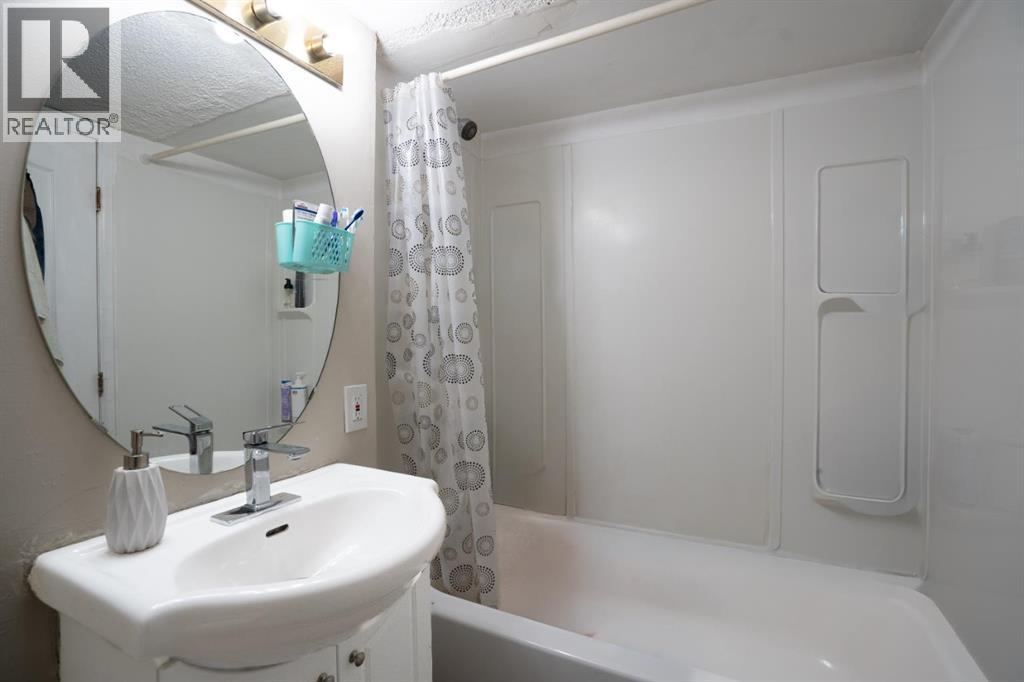 Single Family House 4 Level for Sale in  Laguna Way NE Monterey Park Calgary 