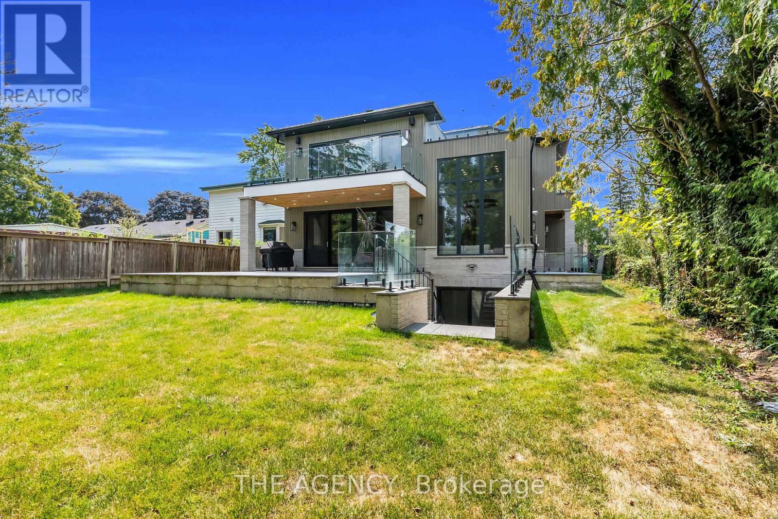 Rear elevation W/large porch and private backyard