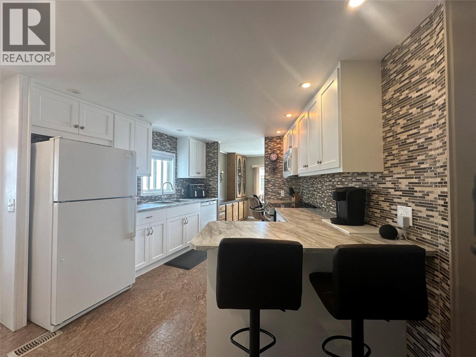 6601 Tucelnuit Drive Unit# 104, Oliver