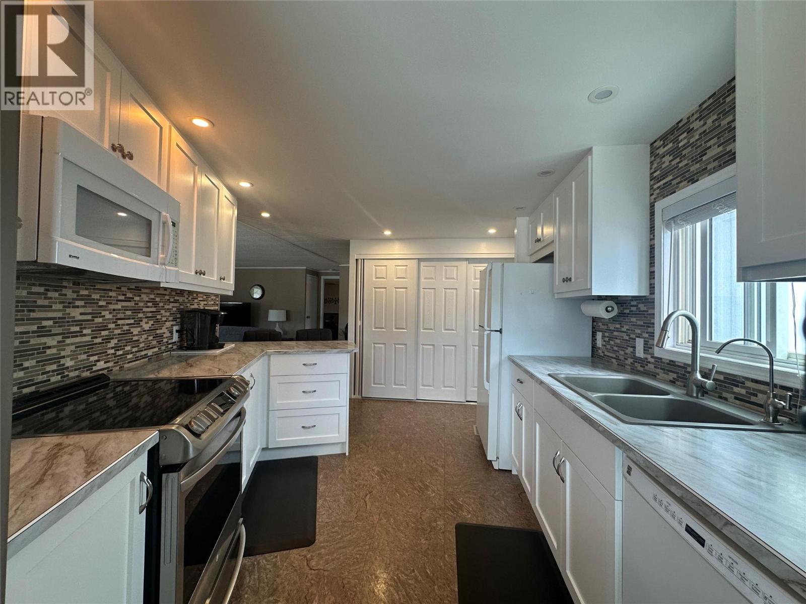 6601 Tucelnuit Drive Unit# 104, Oliver