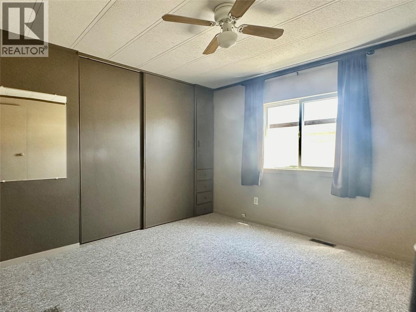 6778 Tucelnuit Drive Unit# 26, Oliver