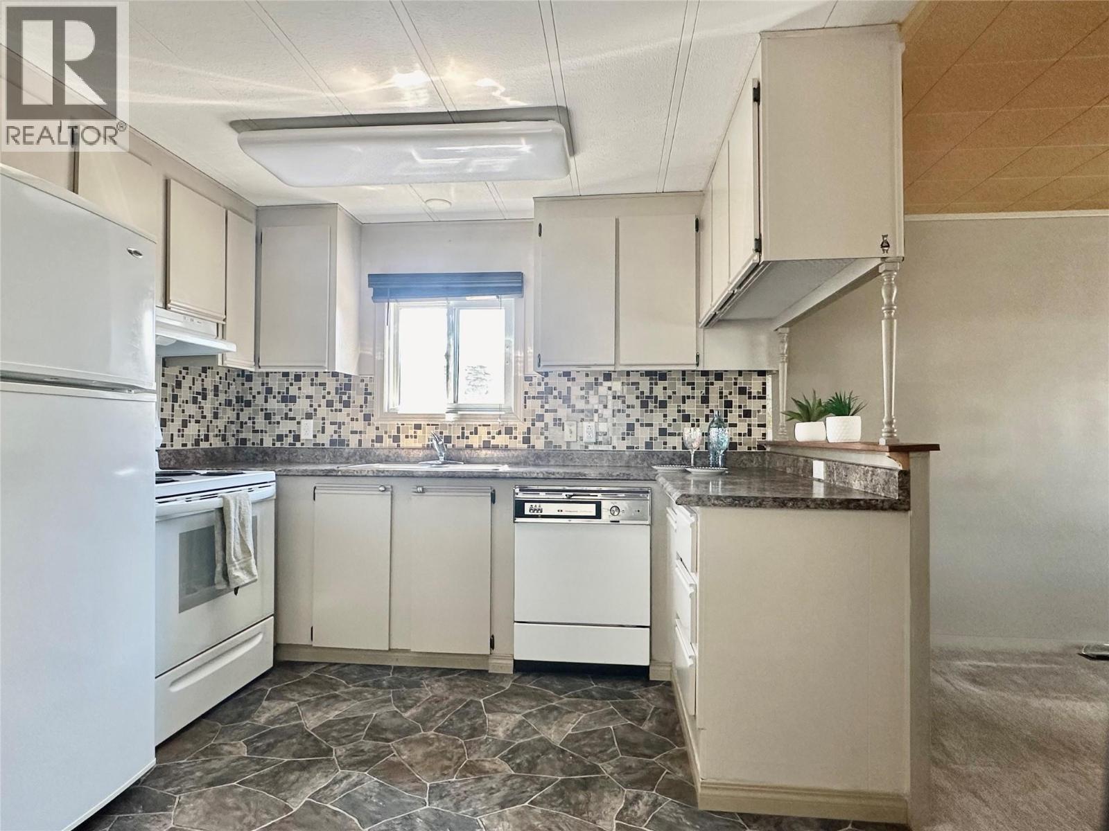 6778 Tucelnuit Drive Unit# 26, Oliver