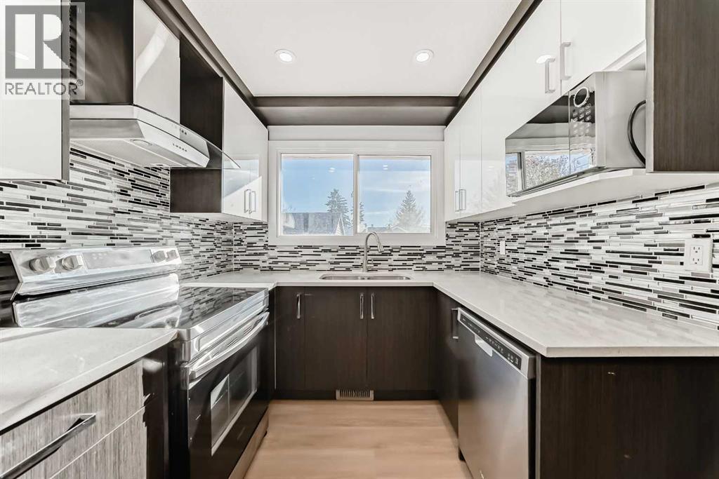 Single Family House Bungalow for Sale in  Pinecliff Way NE Pineridge Calgary 