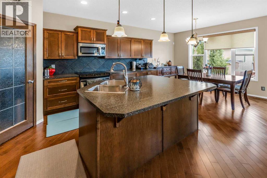 Single Family House for Sale in  Everoak Green SW Evergreen Calgary 