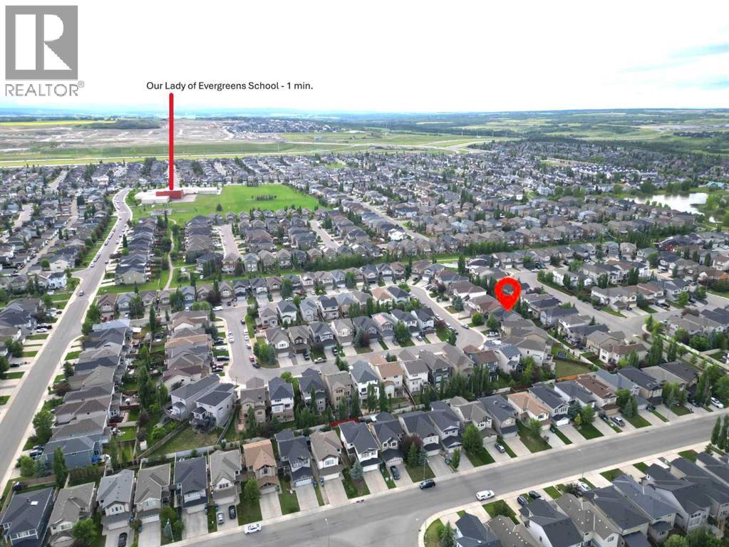 Single Family House for Sale in  Everoak Green SW Evergreen Calgary 