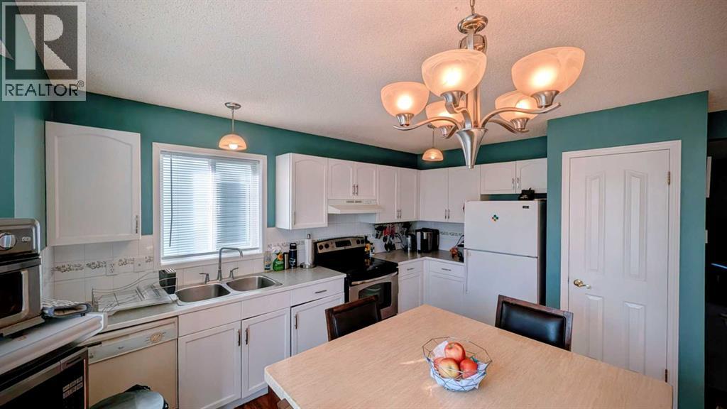 Single Family House for Sale in  Erin Circle SE Erin Woods Calgary 