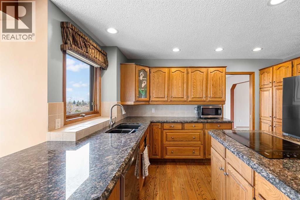 Single Family House for Sale in  Signature Way SW Signal Hill Calgary 