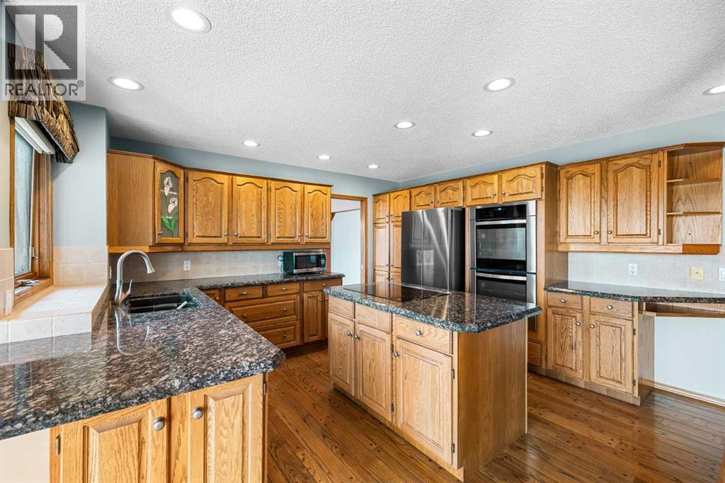 Single Family House for Sale in  Signature Way SW Signal Hill Calgary 