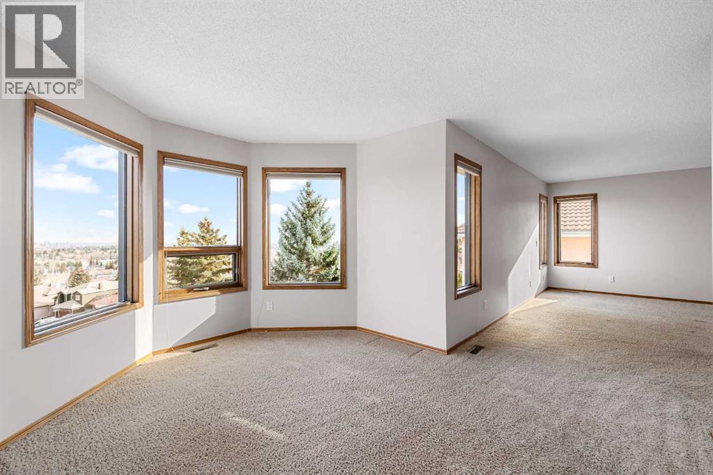 Single Family House for Sale in  Signature Way SW Signal Hill Calgary 