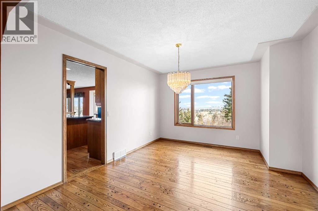 Single Family House for Sale in  Signature Way SW Signal Hill Calgary 