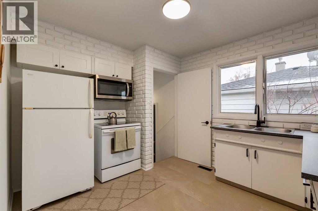 Multi-family House Bungalow for Sale in  &  Winston Drive SW Westgate Calgary 