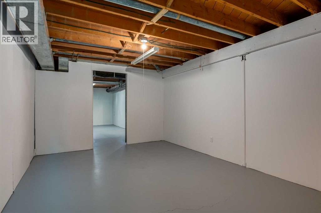 Multi-family House Bungalow for Sale in  &  Winston Drive SW Westgate Calgary 