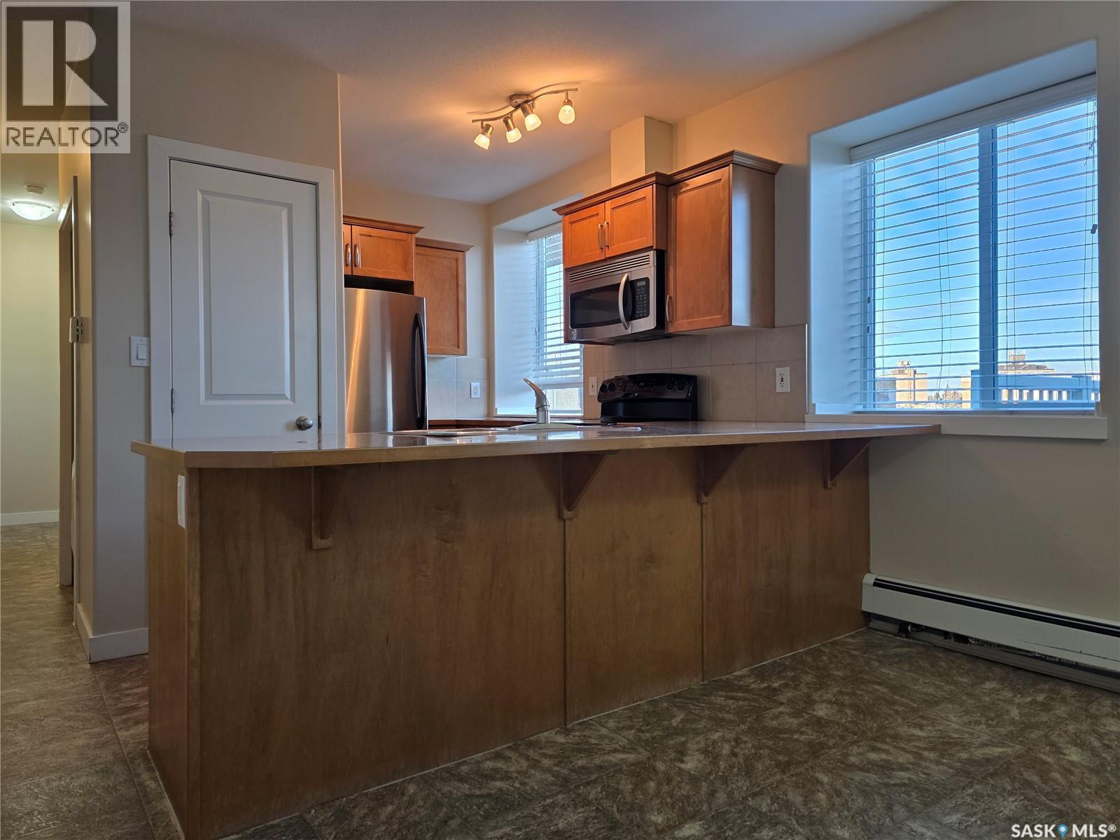 108 302 Bemister AVENUE E - Photo 5 of 13, Melfort, Saskatchewan