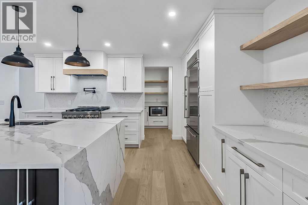 Single Family House Bungalow for Sale in  Lake Twintree Road SE Lake Bonavista Calgary 