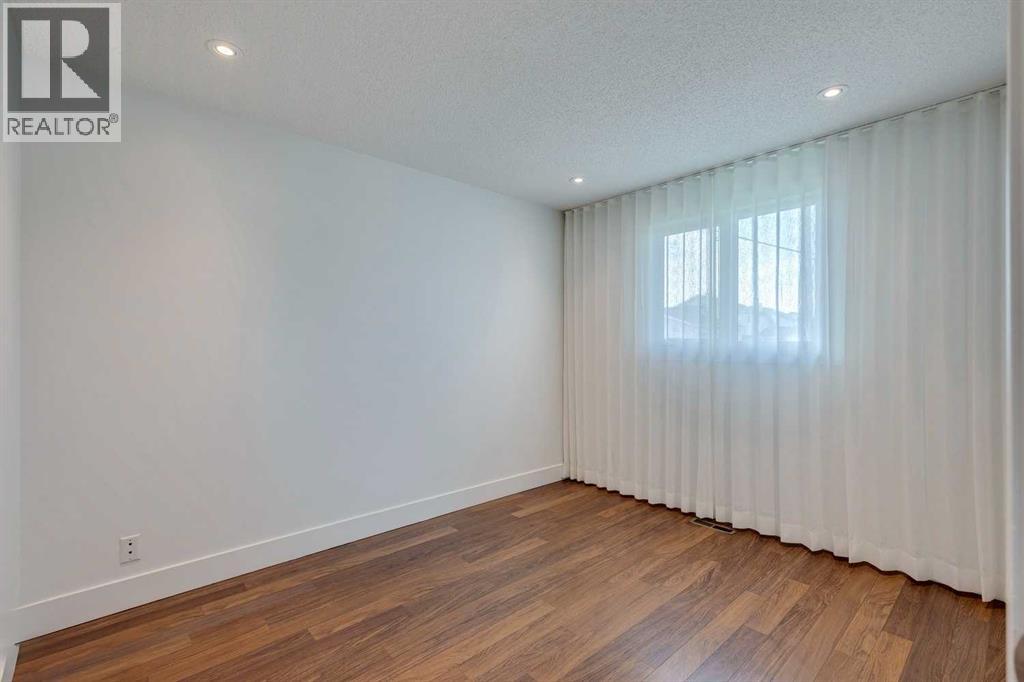 Single Family House Bungalow for Sale in  Erin Grove Court SE Erin Woods Calgary 