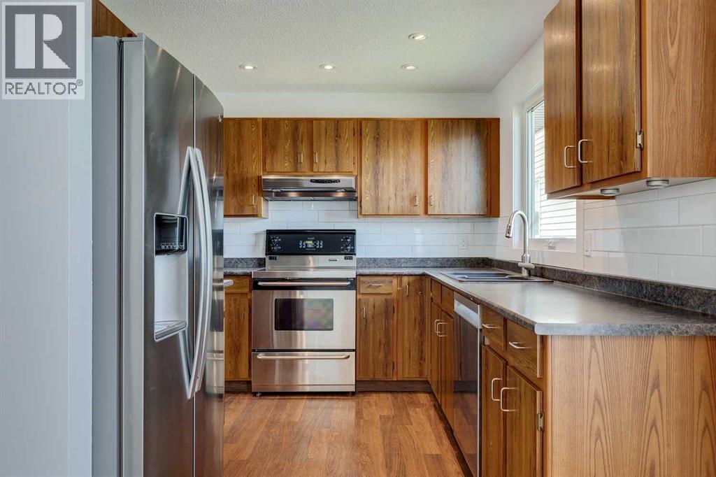 Single Family House Bungalow for Sale in  Erin Grove Court SE Erin Woods Calgary 