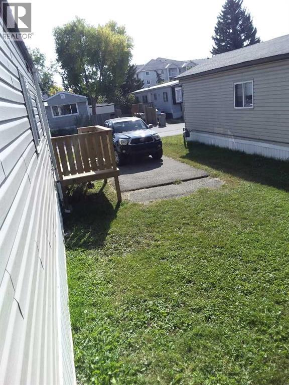 Single Family House Mobile Home for Sale in    Avenue SE Red Carpet Calgary 