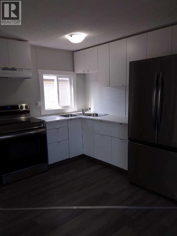 Single Family House Mobile Home for Sale in    Avenue SE Red Carpet Calgary 