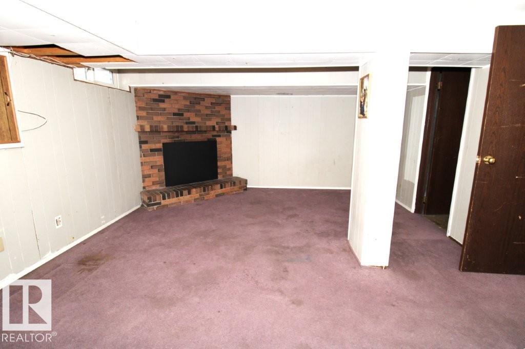 Living and dining space inside 13027 34 ST NW Belmont townhouse