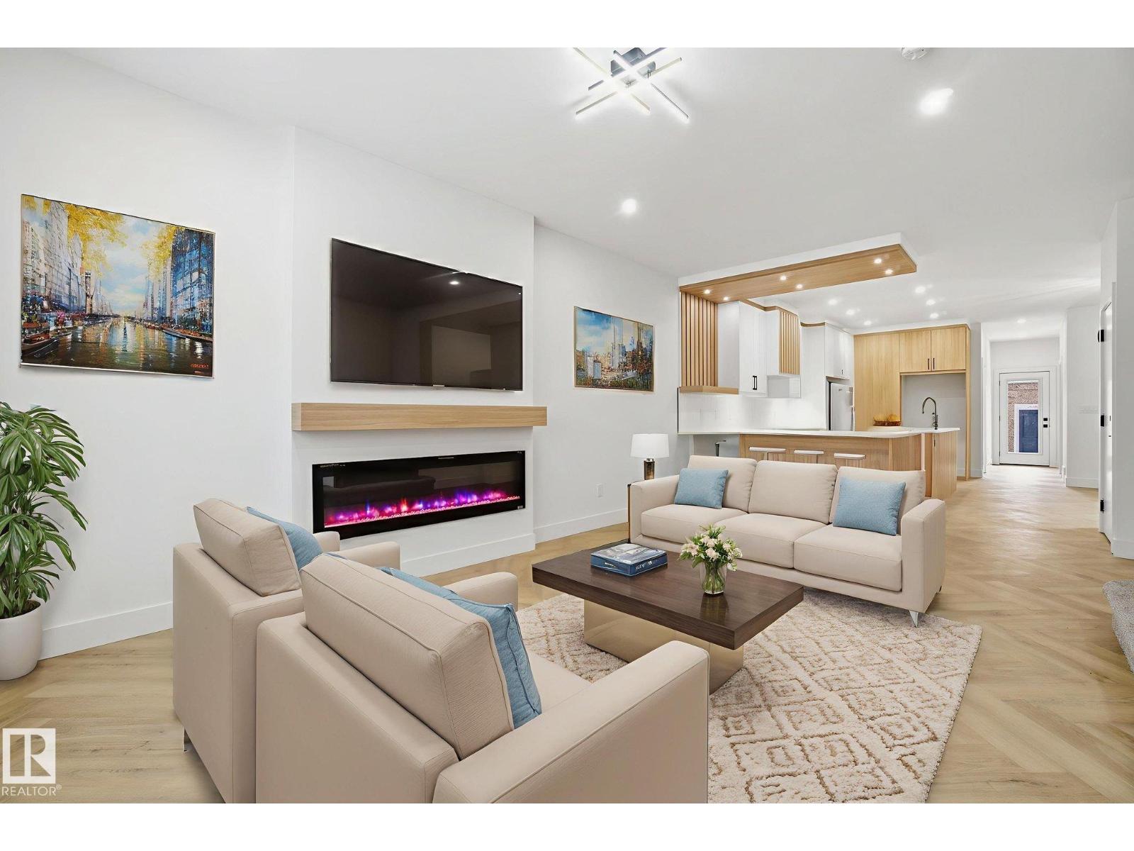 Main floor living and kitchen area in 10919 79 AV NW Garneau