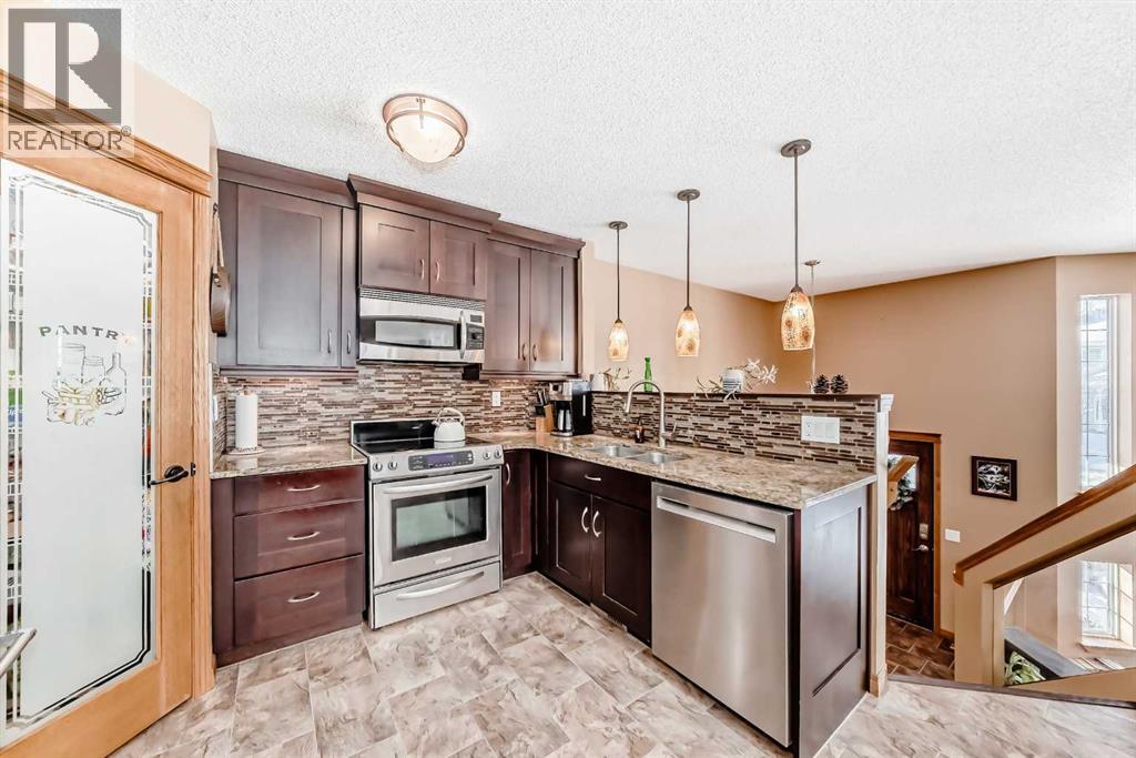 Single Family House Bi-level for Sale in  Hidden Spring Green NW Hidden Valley Calgary 