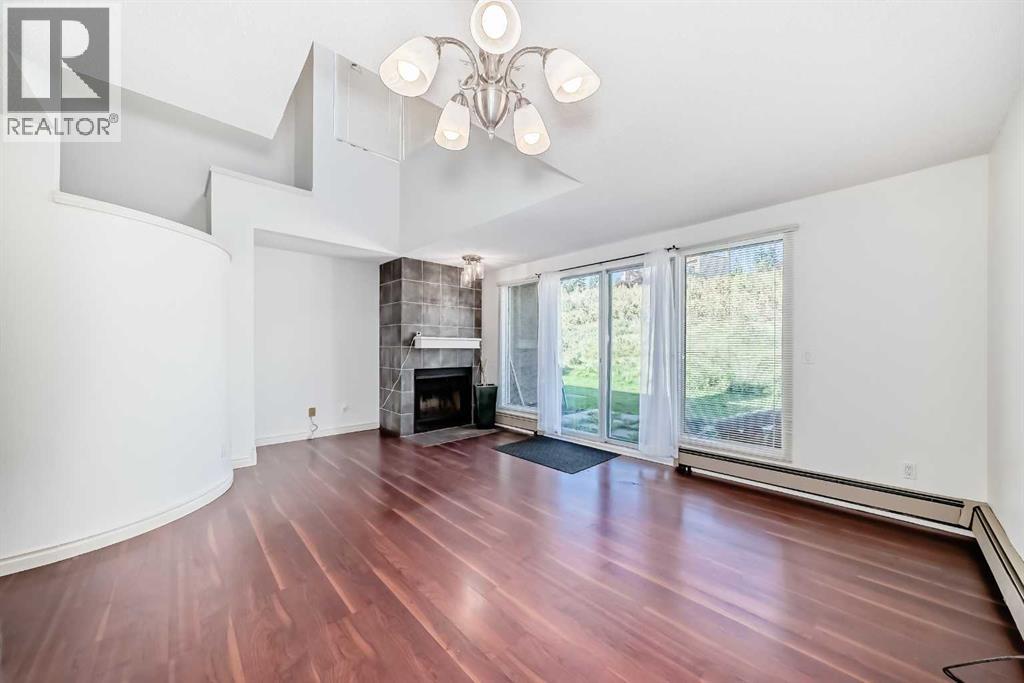 Single Family House Multi-level for Sale in   Village Mews SW Patterson Calgary 