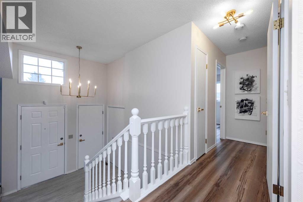 Single Family House Bi-level for Sale in  Hawkstone Drive NW Hawkwood Calgary 