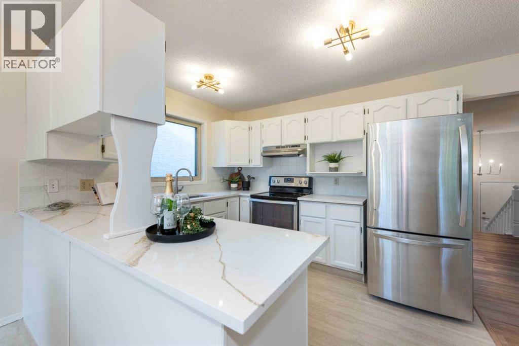 Single Family House Bi-level for Sale in  Hawkstone Drive NW Hawkwood Calgary 