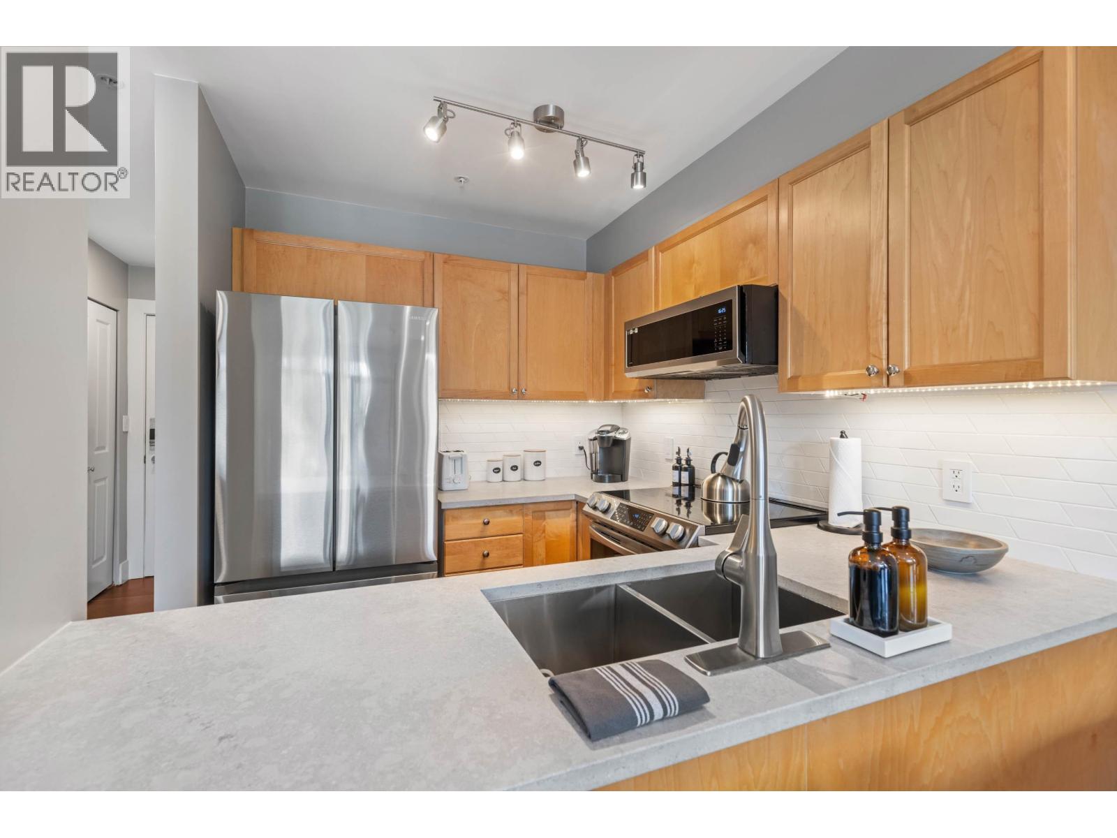 210 8080 NICKLAUS NORTH BOULEVARD, Whistler