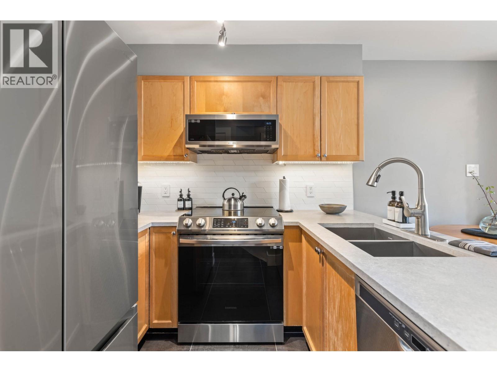 210 8080 NICKLAUS NORTH BOULEVARD, Whistler