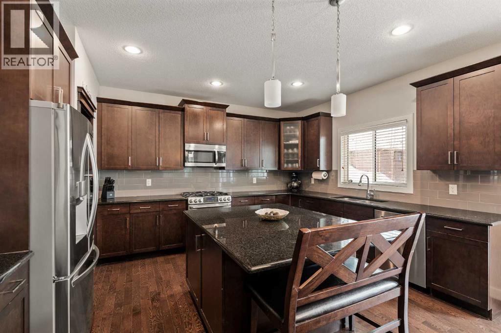 Single Family House for Sale in  Crestridge Mews SW Crestmont Calgary 