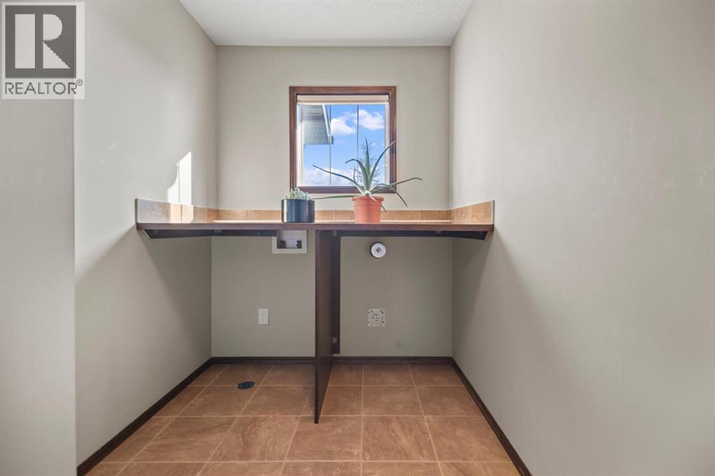 Single Family House for Sale in  Everbrook Way SW Evergreen Calgary 