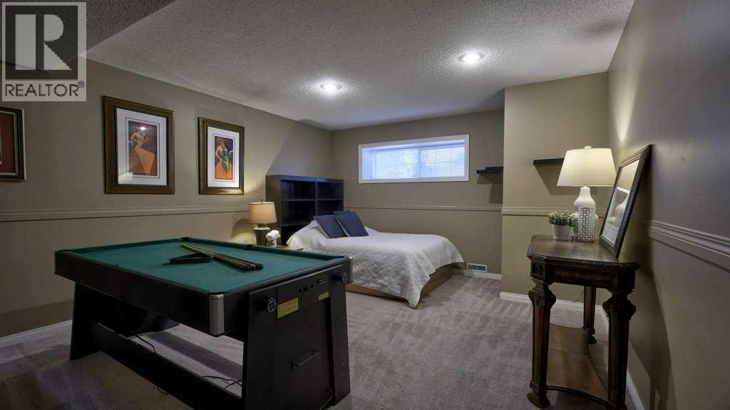 Single Family House Bungalow for Sale in  Sierra Morena Green SW Signal Hill Calgary 